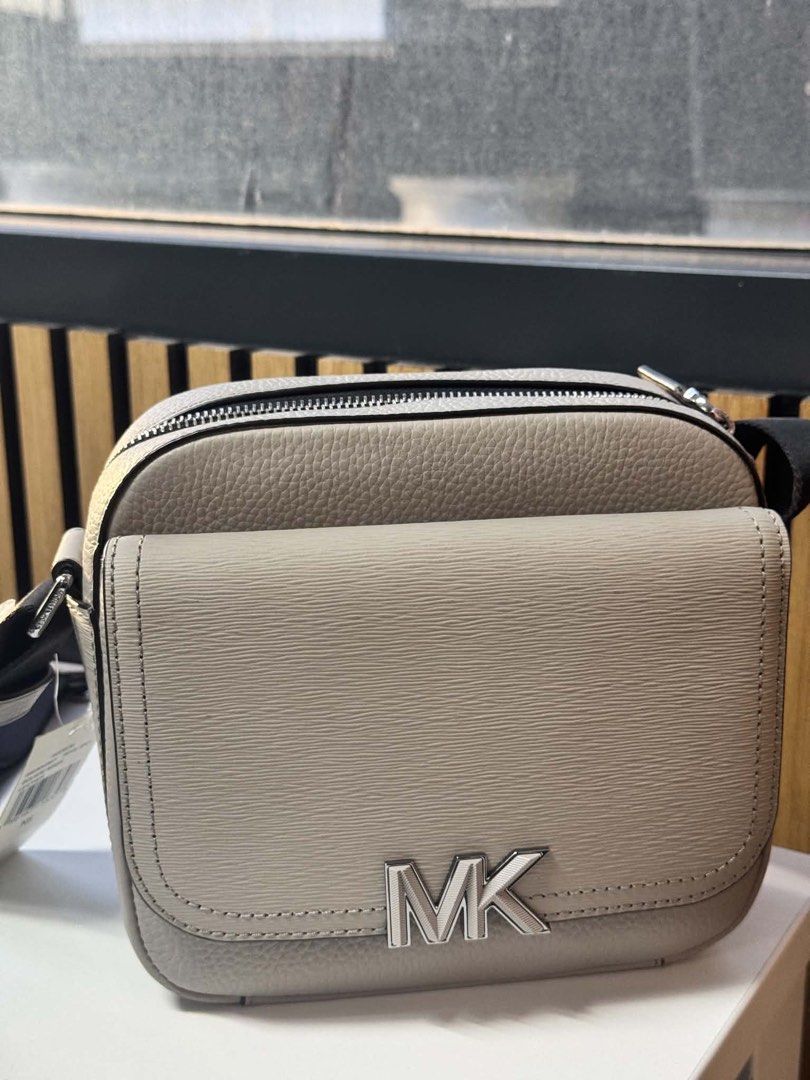 Micheal Kors Cooper/Hudson (Category: Luxury Bags & Wallets) located in Marilao. Submitted by carlokilla (Listing ID 1467660671, Image 1). Description: Brand New Authentic Michael Kors Cooper (Hudson) Textured Leather Crossbody Bag. Light Gray Greige Colorway.