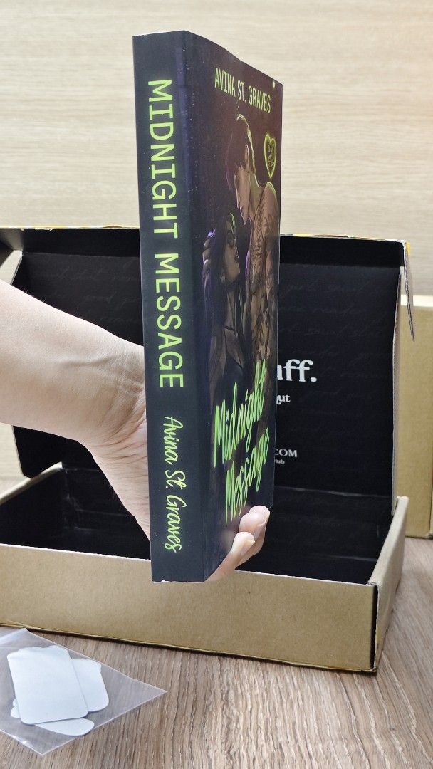 Midnight Message by Avina St. Graves special edition book (Category: Storybooks) located in Quezon City. Submitted by it.pre.loved.booksph (Listing ID 1467754114, Image 2). Description: - Title: Midnight Message by Avina St. Graves - Edition: Special Probably Smut Book Club Exclusive - Condition: Brand new, unread, pristine packaging - Inclusions: Annotation tabs, custom bookmark with color-coded key, and a themed sticker pack - Perfect for colle