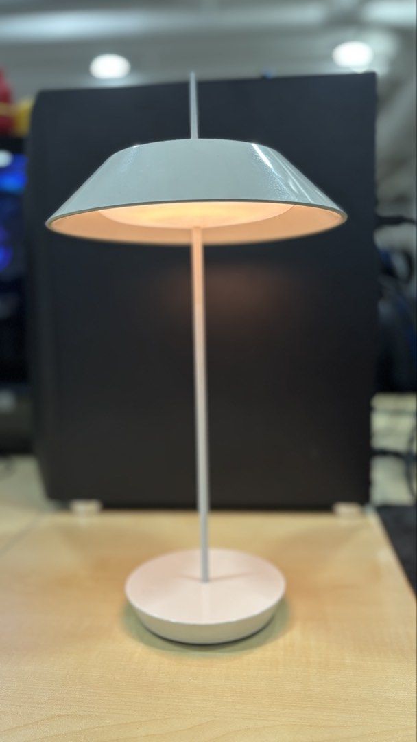 Minimalist White LED Table Lamp (Category: Lighting) located in Manila. Submitted by giomarcela14180 (Listing ID 1467622406, Image 1). Description: - Color: Sleek white with clean modern lines - Design: Cordless and battery-powered for easy portability - Lighting: Bright warm LED light - Control: Convenient touch control right from the base - Ideal Use: Perfect for study desks, workspaces, or bedside tables - Condition: Works great and ready to u