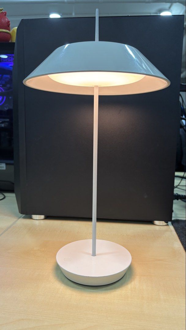 Minimalist White LED Table Lamp (Category: Lighting) located in Manila. Submitted by giomarcela14180 (Listing ID 1467622406, Image 2). Description: - Color: Sleek white with clean modern lines - Design: Cordless and battery-powered for easy portability - Lighting: Bright warm LED light - Control: Convenient touch control right from the base - Ideal Use: Perfect for study desks, workspaces, or bedside tables - Condition: Works great and ready to u