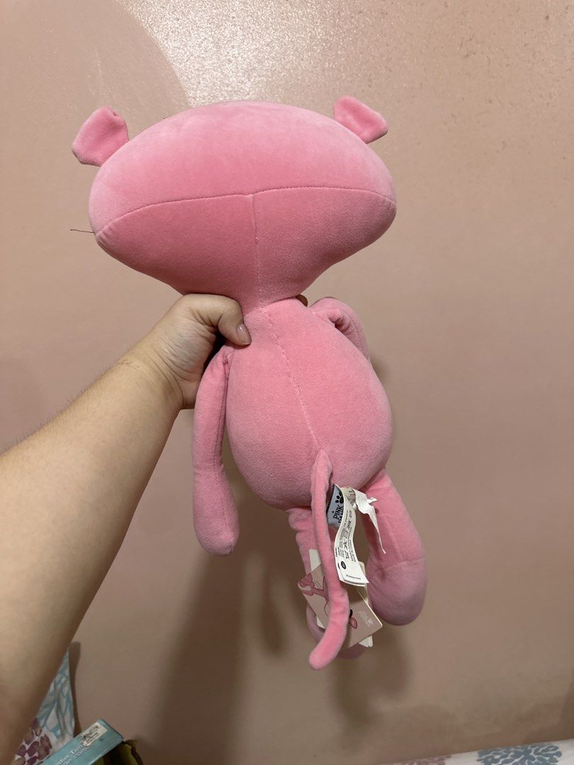 Miniso Pink Panther Stuffed Toy (Category: Plushies & Soft Toys) located in Manila. Submitted by chantalbe69523 (Listing ID 1467725998, Image 2). Description: - Brand: Official Miniso Licensed Pink Panther - Condition: Brand new with original swing tags attached - Material: Ultra-soft pink fabric - Features: Classic sleepy eyes and bright red nose - Size: Standard medium - Ideal for: Gifting, collection, or cute room decor Needs cleaning lang.