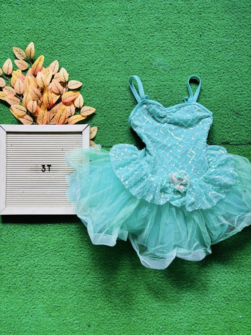 Mint green sequin tutu dance dress size 3T (Category: Babies & Kids Fashion) located in San Mateo. Submitted by ariakid47 (Listing ID 1467609034, Image 1). Description: - Mint green dance dress, size 3T - Sparkling sequins on the bodice - Fluffy layered tutu skirt with waist flower accent - Thin shoulder straps - Clean and bright fabric, ready for dance or dress-up - Ships immediately from a trusted seller!.