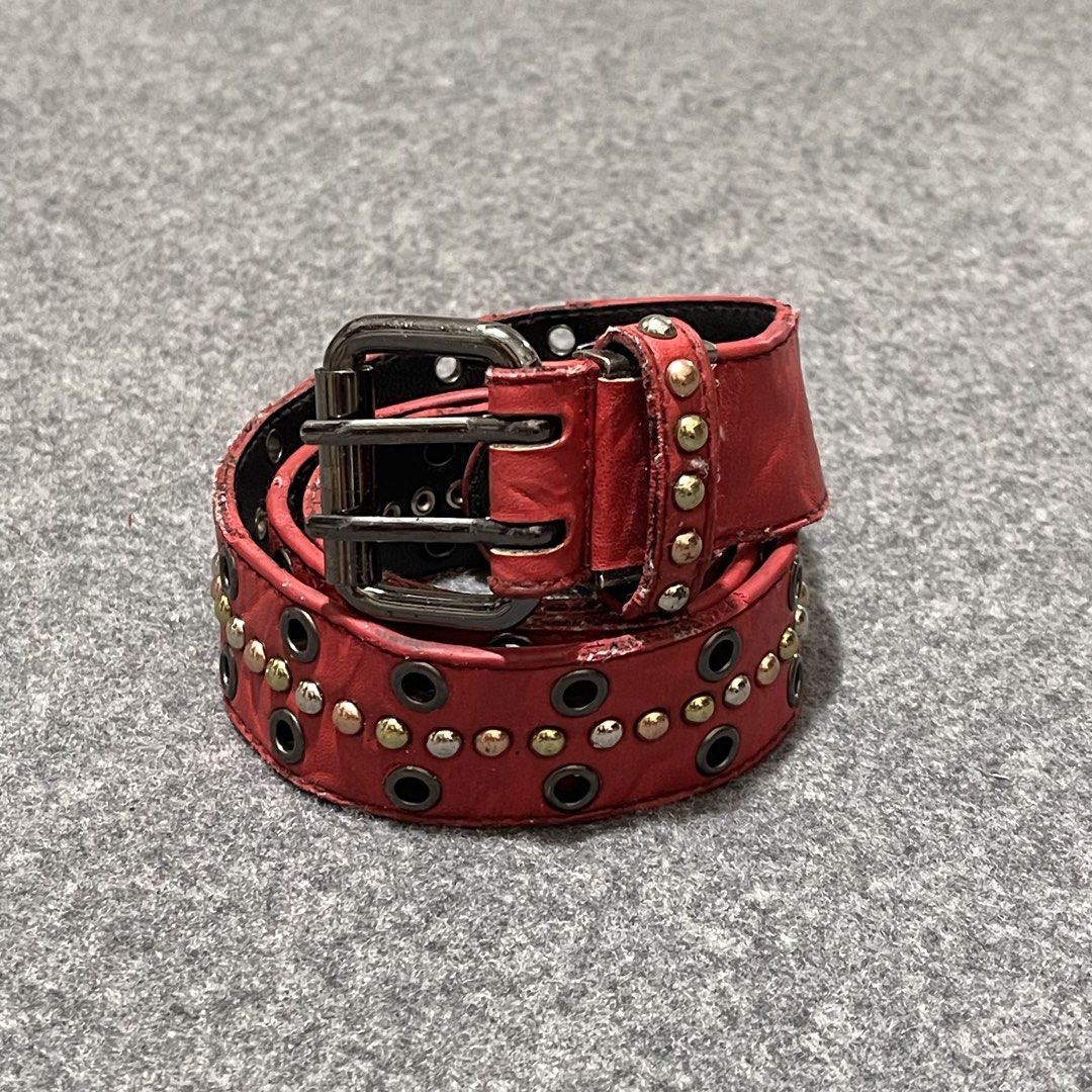 Miss EDWIN - Red Studded Belt (25-34) (Category: Belts) located in Pasig City. Submitted by _rosasass_ (Listing ID 1467738582, Image 1). Description: Authntic excellent condition Waistline 25-34 Length 39.5 inch Width 1.3 inch.