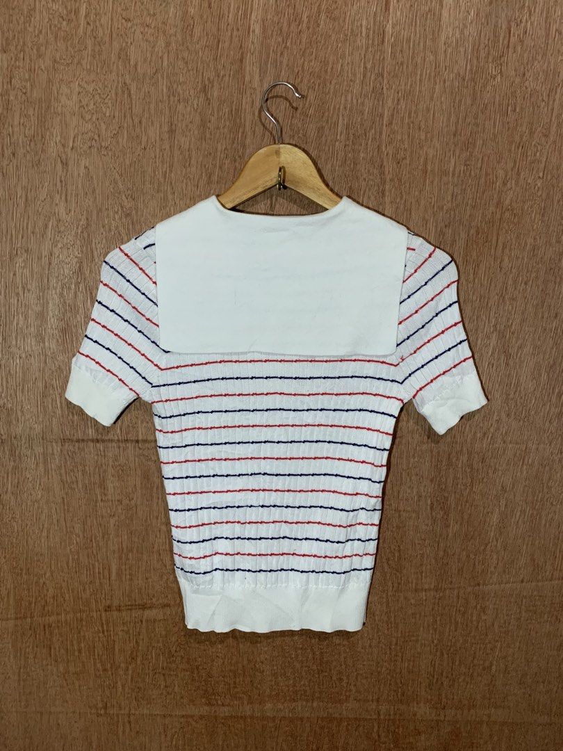 Miu Miu Striped Sailor Collar Knit Top (Category: Blouses) located in Tacurong. Submitted by ljsthrift (Listing ID 1467603205, Image 2). Description: - Brand: Miu Miu - Style: White knit top with red and blue horizontal stripes - Details: Sailor collar, V-neckline, embroidered brand logo patch on chest, ribbed hem and cuffs - Sleeves: Short sleeves - Interior Tag Code: AMAS 2020 1733 MMF441 1YVO - Condition: Excellent, well-maintained .