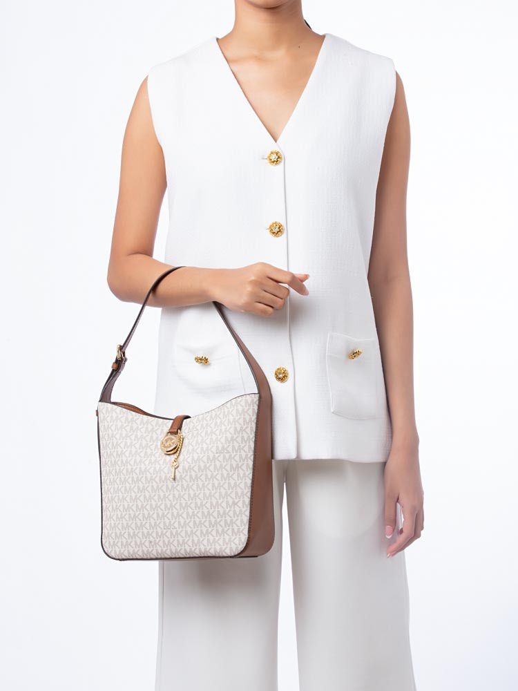 MK Michael Kors Lyra Small Shoulder Bag (Category: Shoulder Bags) located in Manila. Submitted by closettease (Listing ID 1467611544, Image 2). Description: Can provide MK paperbag, guaranteed original, small tote bag, snap closure with zipper pocket inside Send pm for more pictures, not including all of the photos here to avoid photo grabbing 🤍.