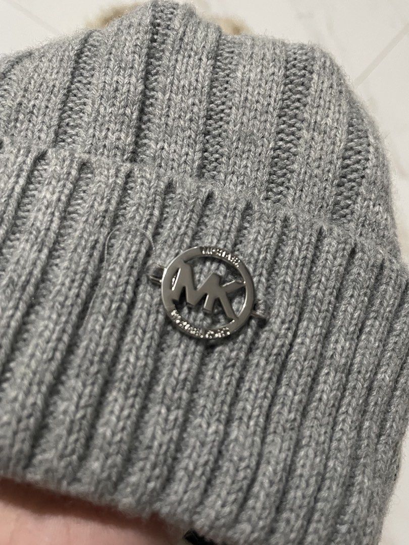 MK pom beanie (Category: Hats & Beanies) located in Naga. Submitted by alleb100493 (Listing ID 1467805041, Image 2). Description: like new .