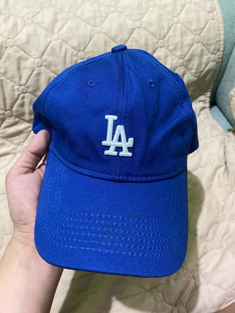 MLB Los Angeles Dodgers Blue Cap Hat (Category: Caps & Hats) located in Quezon City. Submitted by elihur.tuazon (Listing ID 1467808954, Image 2). Description: - Authentic MLB Los Angeles Dodgers baseball cap - Striking royal blue color with classic embroidered white LA logo - Adjustable strapback closure fitted with a secure silver metal clasp - Genuine quality featuring official MLB branded interior taping and tags - Versatile everyday accessory