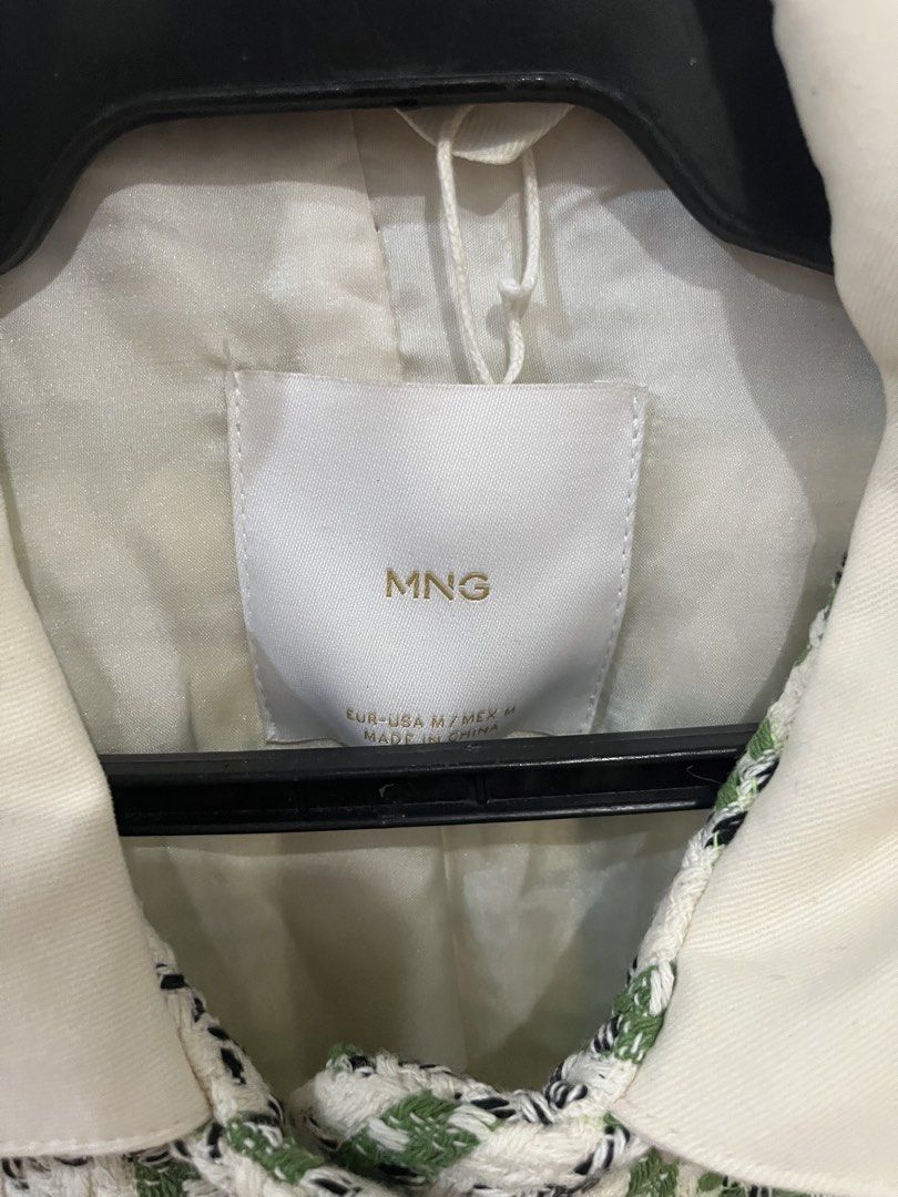 MNG Green Tweed Jacket Size M (Category: Coats, Jackets and Outerwear) located in Makati City. Submitted by grizzlybear95 (Listing ID 1467729091, Image 2). Description: - Brand: MNG - Size: EUR-USA M / MEX M - Colors: Green, white, and black tweed with contrasting cream collar and pocket trim - Details: Button-up front with stylish metallic-rimmed buttons, dual front pockets - Lining: Fully lined interior with a clean fabric finish - Condition: E