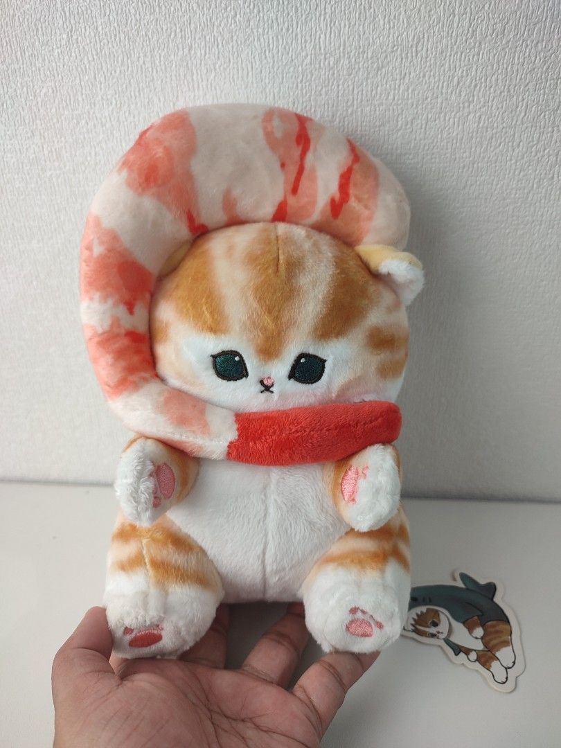 Mofusand Cat Shrimp Prawn Plush Toy (Category: Plushies & Soft Toys) located in Manila. Submitted by epicmountain-f20453 (Listing ID 1467731544, Image 1). Description: - 100% Authentic mofusand cat plush toy in a giant fried shrimp costume - Features adorable orange tabby markings, embroidered green eyes, and pink paw pads - Comes with original paper tag and holographic sticker still attached - Clean fabric and fluffy filling with absolutely no f