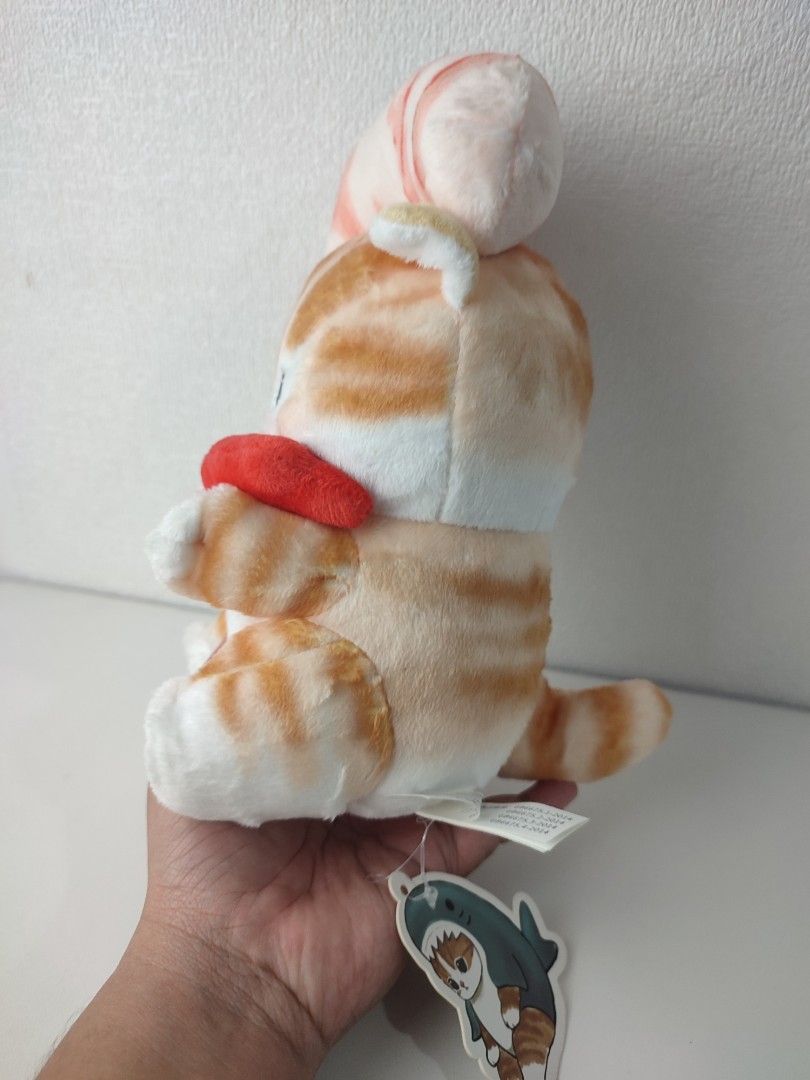 Mofusand Cat Shrimp Prawn Plush Toy (Category: Plushies & Soft Toys) located in Manila. Submitted by epicmountain-f20453 (Listing ID 1467731544, Image 2). Description: - 100% Authentic mofusand cat plush toy in a giant fried shrimp costume - Features adorable orange tabby markings, embroidered green eyes, and pink paw pads - Comes with original paper tag and holographic sticker still attached - Clean fabric and fluffy filling with absolutely no f