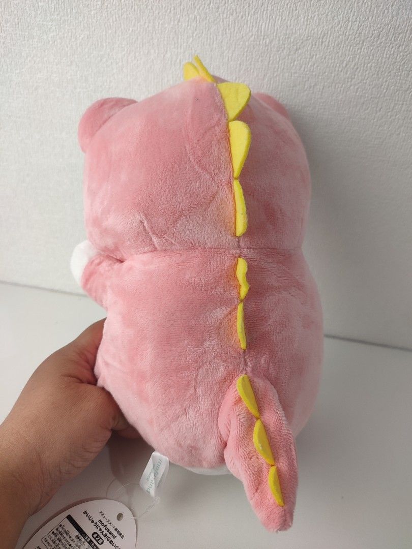 Mofusand Pink Dinosaur Cat Plush (Category: Plushies & Soft Toys) located in Manila. Submitted by epicmountain-f20453 (Listing ID 1467731647, Image 3). Description: - Authentic Mofusand cat plush wearing an adorable pink dinosaur costume - Super soft fabric with cute embroidered paw pads on hands and feet - Features a white belly, striking green eyes, a playful pink tongue, and yellow spikes on the back and tail - Perfect for gifts or Mofusand co