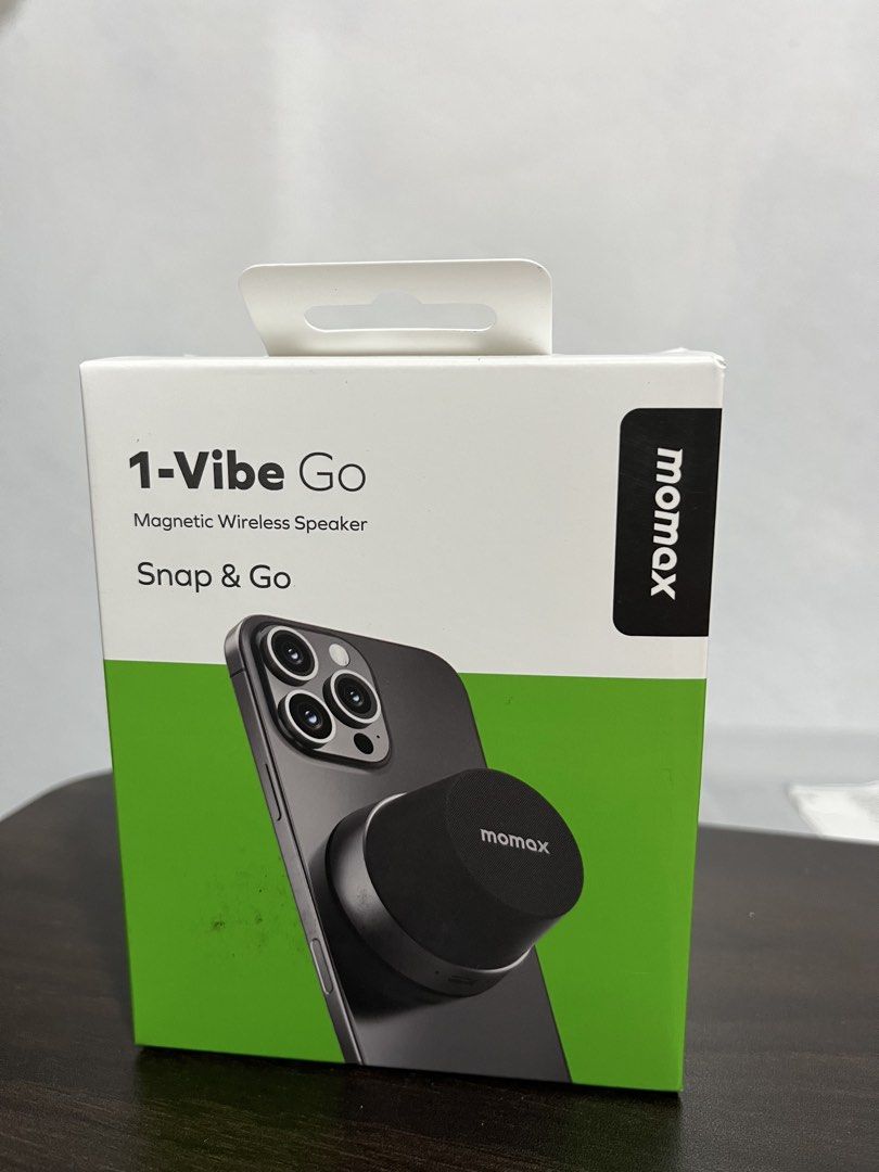 MOMAX Magnetic Wireless Speaker (Category: Other Gadgets) located in Caloocan City. Submitted by bloomstoday (Listing ID 1467673581, Image 1). Description: - Brand: MOMAX - Model: 1-Vibe Go Magnetic Wireless Speaker (BS6) - Color: Black - Condition: Brand new in box - Magnetic Attachment: Snaps easily onto your phone or metal surfaces - 2-in-1 Design: Functions as both a wireless speaker and a phone stand - Sound: True Wireless Stereo (TWS) for g