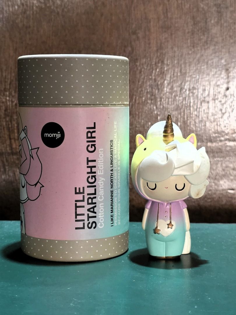 Momiji Figurine - Starlight (Category: Figurines & Statues) located in Davao. Submitted by newfire.1b3f4d (Listing ID 1467603706, Image 1). Description: A lovely pastel Momiji collectible looking for a new home! 🦄✨ Features a unicorn hood with a gold horn, white hair, and a pastel pink and mint outfit with gold star details. Comes with its matching cylindrical packaging. Has a hidden message slot at the bottom for a small handwritten note—perfec
