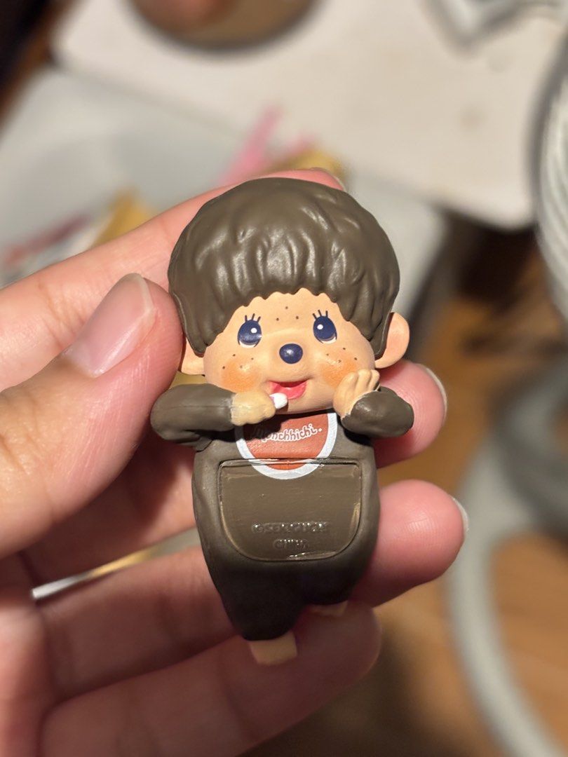 Monchhichi Hipper Decorative Mini Figure Blind Box (Category: Designer & Blind Box Toys) located in Cabuyao City. Submitted by avii_cho (Listing ID 1467805655, Image 2). Description: - Item: Authentic Monchhichi Hipper Blind Box Mini Figure - Character: Brown monkey in an overall outfit with a red bib - Condition: Brand new, pulled straight from the box and opened only to check the design - Inclusions: Complete with original foil wrapper and yell