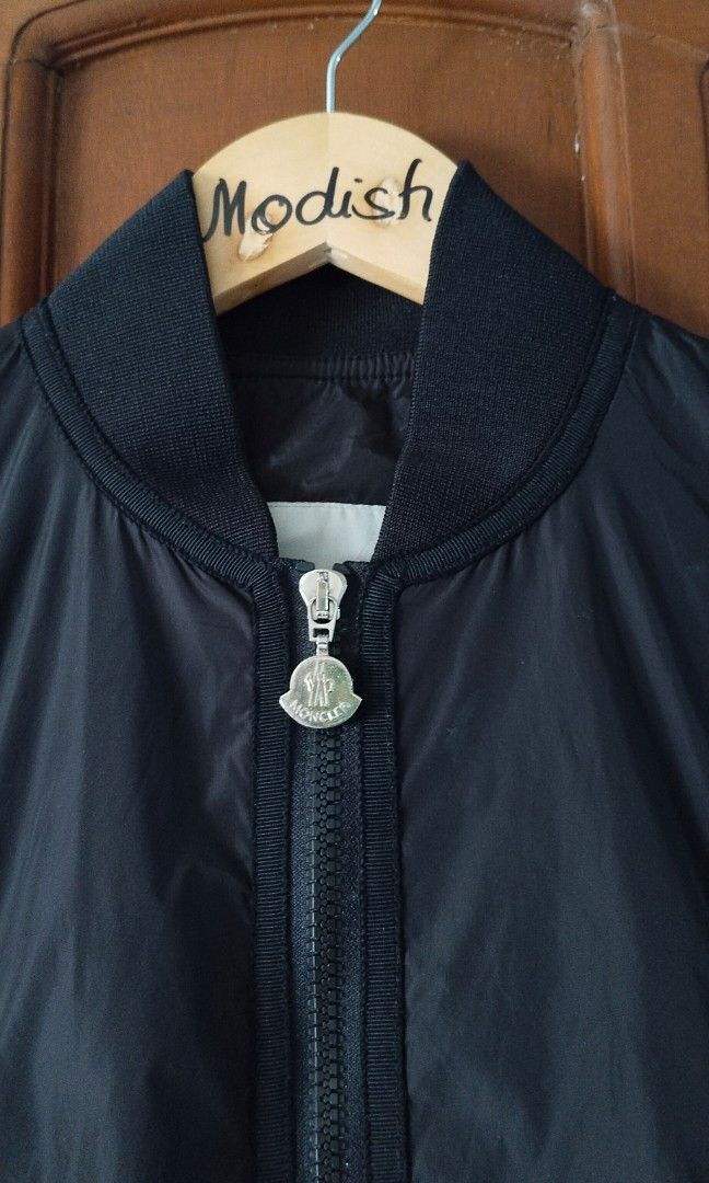 Moncler. nylon Jacket Black (Category: Luxury Apparel) located in Caloocan City. Submitted by modishthriftstore (Listing ID 1467747040, Image 3). Description: Disclaimer: FIRST photo is for reference only, pls swipe for Actual images Medium size adjustable drawstring Ruched Sleeves, Unique & Stylish Minor Issue: Last photo.