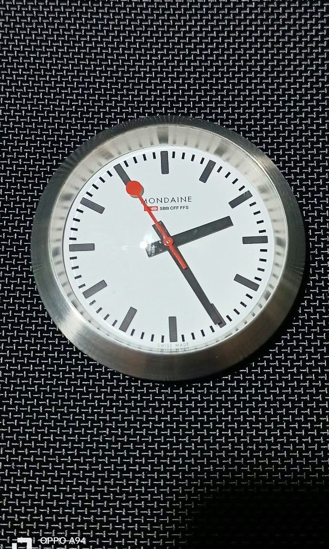 Mondaine swiss watch (Category: Clocks) located in Quezon City. Submitted by Bernz (Listing ID 1467710471, Image 2). Description: The item in the image is a Mondaine Official Swiss Railways Globe Clock (Model: A660.30335.16SBP). Key Details & Specifications Design: Inspired by the iconic 1944 Swiss station clock created by engineer Hans Hilfiker, featuring the signature minimalist Bauhaus aesthetic and the recognizable red "lollipop" second hand.