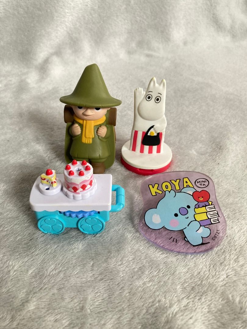 Moomin figures and BT21 KOYA acrylic charm bundle (Category: Character Goods) located in Rizal. Submitted by sheeraay (Listing ID 1467704909, Image 1). Description: - Authentic Moomin & BT21 Character Bundle - Includes Moominmamma and Snufkin figures - Comes with a miniature dessert cart and tiny cakes - Includes a bonus BT21 KOYA acrylic sticker/charm - All items sold as one complete lot (as shown in photos).