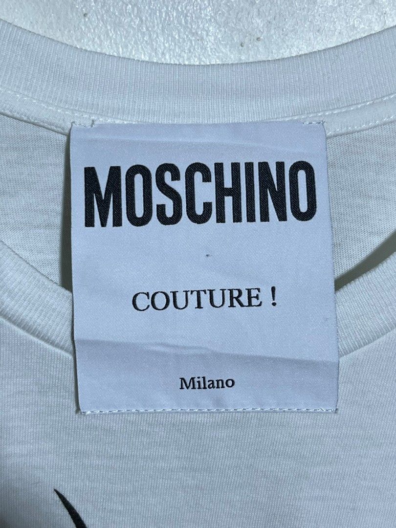 MOSCHINO COUTURE SHIRT (Category: Tshirts & Polo Shirts ) located in Dumaguete. Submitted by kingepoy (Listing ID 1467624941, Image 3). Description: Medium Width 20.5 / Length 28 Excellent Condition 9.8/10 Color Rate No issues.