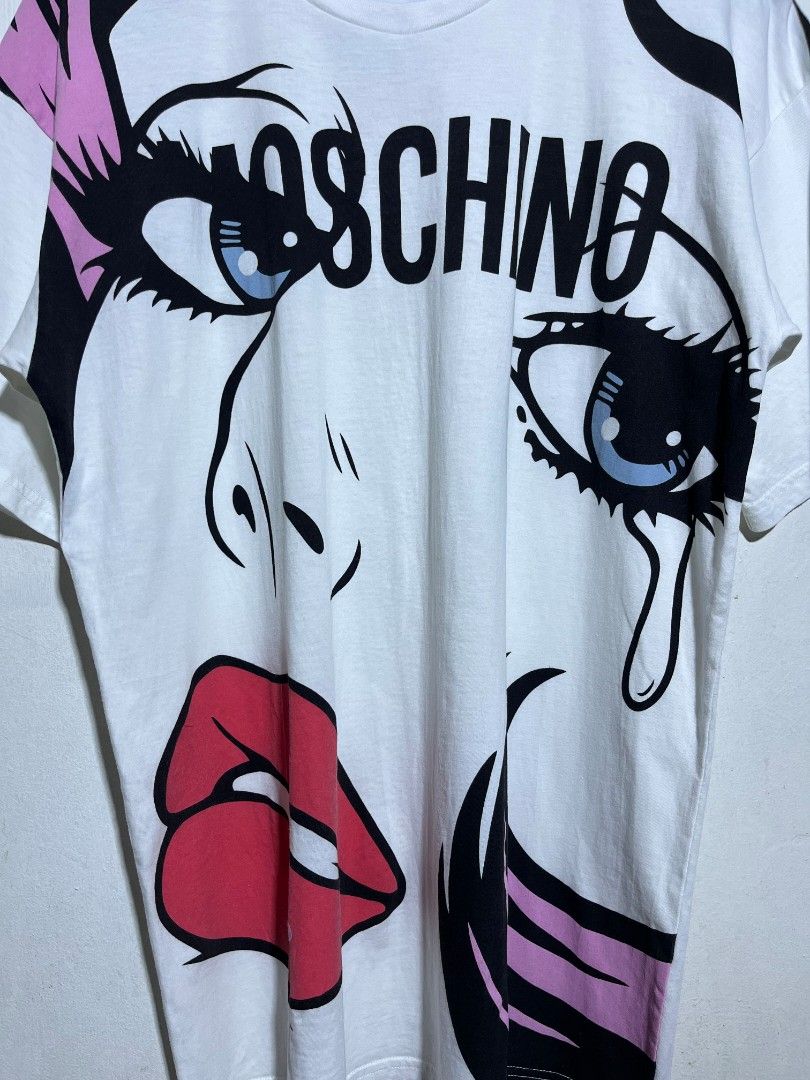 MOSCHINO COUTURE SHIRT (Category: Tshirts & Polo Shirts ) located in Dumaguete. Submitted by kingepoy (Listing ID 1467624941, Image 2). Description: Medium Width 20.5 / Length 28 Excellent Condition 9.8/10 Color Rate No issues.