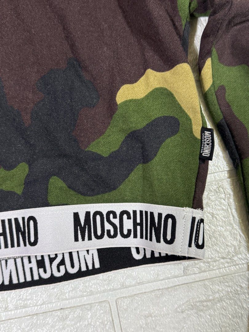 Moschino cropped sweater (Category: Longsleeves) located in Quezon City. Submitted by dailyfits08 (Listing ID 1467837815, Image 2). Description: Moschino Size xs Excellent 19.5x19.5 .