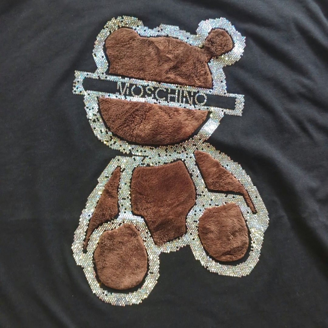 MOSCHINO Tee (Category: Activewear) located in Manila. Submitted by thriftinefolife (Listing ID 1467794266, Image 3). Description: Excellent Condition.