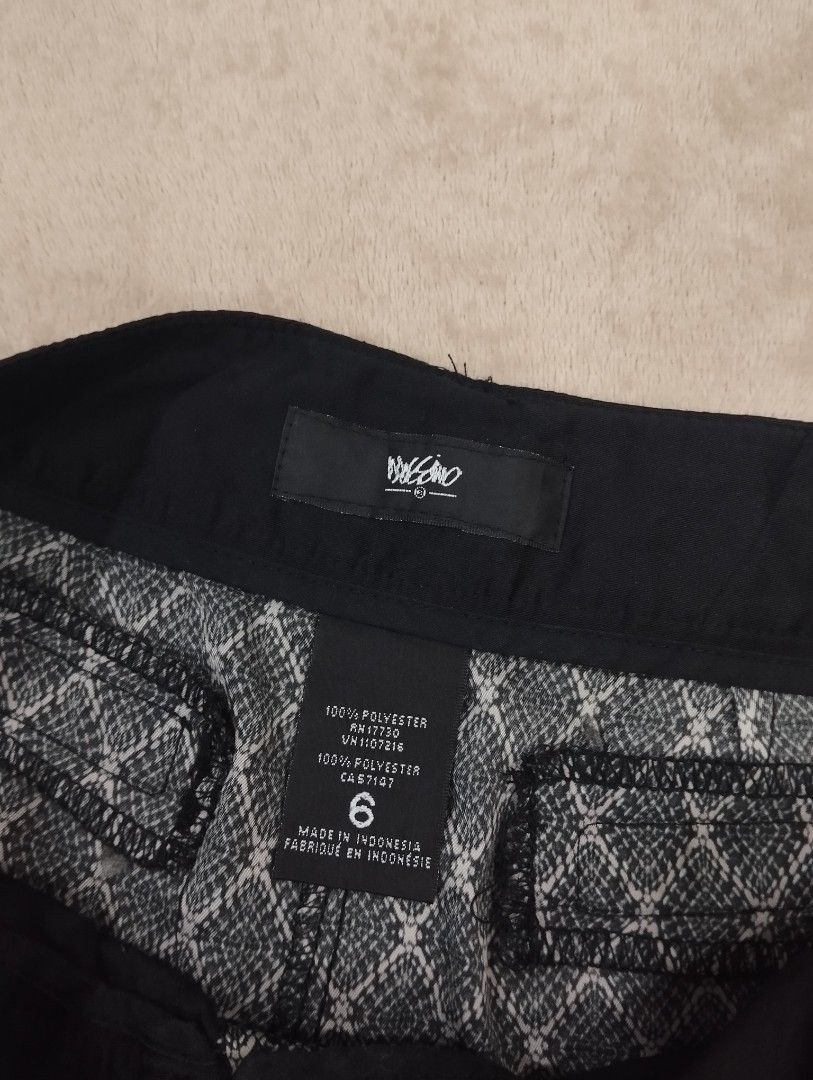 Mossimo Supply Co. Women Shorts Bundle Set (Category: Shorts) located in Dagupan City. Submitted by nartleb_naan (Listing ID 1467656253, Image 3). Description: Bundle of two pairs of women's shorts from Mossimo. First pair features a black waistband and grey diamond patterned fabric, size 6, 100% polyester. Second pair is an olive green textured fabric with an elastic drawstring waist, size XS. Both casual pieces, ready for warmer weather outfits