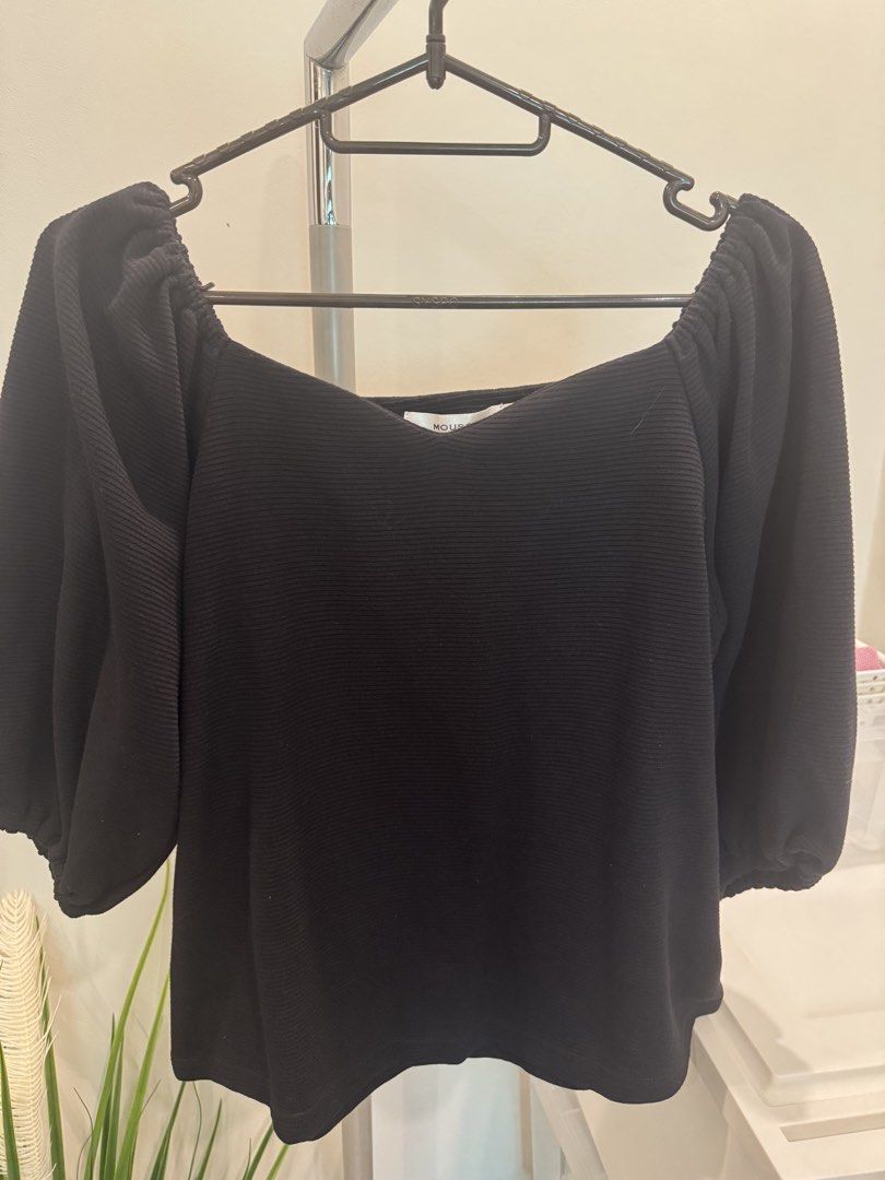 MOUSSY Black Square Neck Puff Sleeve Top (Category: Blouses) located in Quezon City. Submitted by actank (Listing ID 1467612191, Image 1). Description: - Brand: Moussy - Color: Black - Size: Free size - Details: Square neckline, voluminous puff sleeves, ribbed knit texture - Style Tip: Versatile piece that pairs easily with denim or skirts - Care: Clean and ready to wear.
