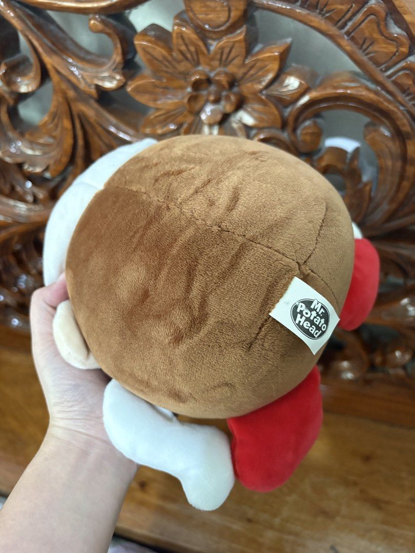 Mrs. Potato Head plush toy (Category: Plushies & Soft Toys) located in Quezon City. Submitted by rxyel (Listing ID 1467658338, Image 2). Description: - Official Mrs. Potato Head plush toy from the classic collection - Features signature white hat, big eyes with lashes, pink ears, and red feet - Official brand logo tag securely sewn on the back - Pristine condition: 100% clean, zero stains, and no loose threads - Ideal for toy collectors and fans 