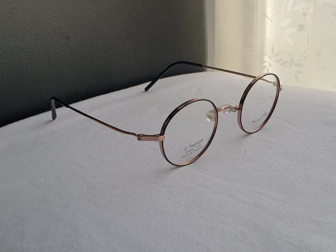 Muccitta Round Titanium Eyeglass Frame (Category: Sunglasses & Eyewear) located in Quezon City. Submitted by WasalakTwo (Listing ID 1467785504, Image 3). Description: New, old stock from Korea Durable and high quality Unisex Goodcondition Lens are graded, but replaceable Open for delivery nationwide Front Width 13.5cm Front Height 4.2cm.