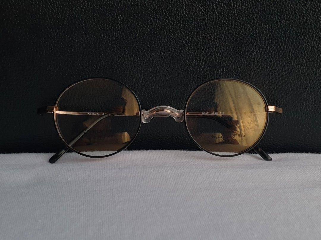 Muccitta Round Titanium Eyeglass Frame (Category: Sunglasses & Eyewear) located in Quezon City. Submitted by WasalakTwo (Listing ID 1467785504, Image 2). Description: New, old stock from Korea Durable and high quality Unisex Goodcondition Lens are graded, but replaceable Open for delivery nationwide Front Width 13.5cm Front Height 4.2cm.