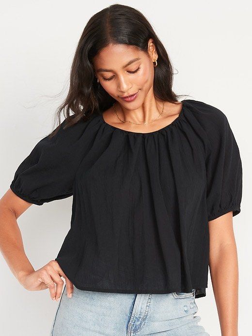 Muji Black Cotton Blouse (Category: Blouses) located in Muntinlupa City. Submitted by caroucella (Listing ID 1467755463, Image 3). Description: - Brand: Muji - Color: Black - Material: 100% Cotton - Size: S but can fit M - Fit: Relaxed fit with short puff sleeves and gathered neckline - Condition: Good, clean, and ready to wear.