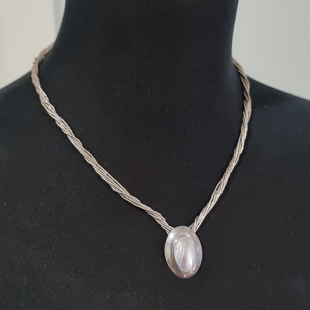 Multi-strand Necklace with Pearl Pendant (Category: Necklaces) located in Pasig City. Submitted by lesmitch (Listing ID 1467645310, Image 3). Description: - Multi-strand silver beaded design with tube beads - Features a smooth oval pendant with pearl stone - Vintage-inspired style that sits close to the collarbone - Length: 20 inc. ~ Check all photos for the item's actual condition and measurements ~ Payment is via gcash, pay maya or bdo ~ Shippi