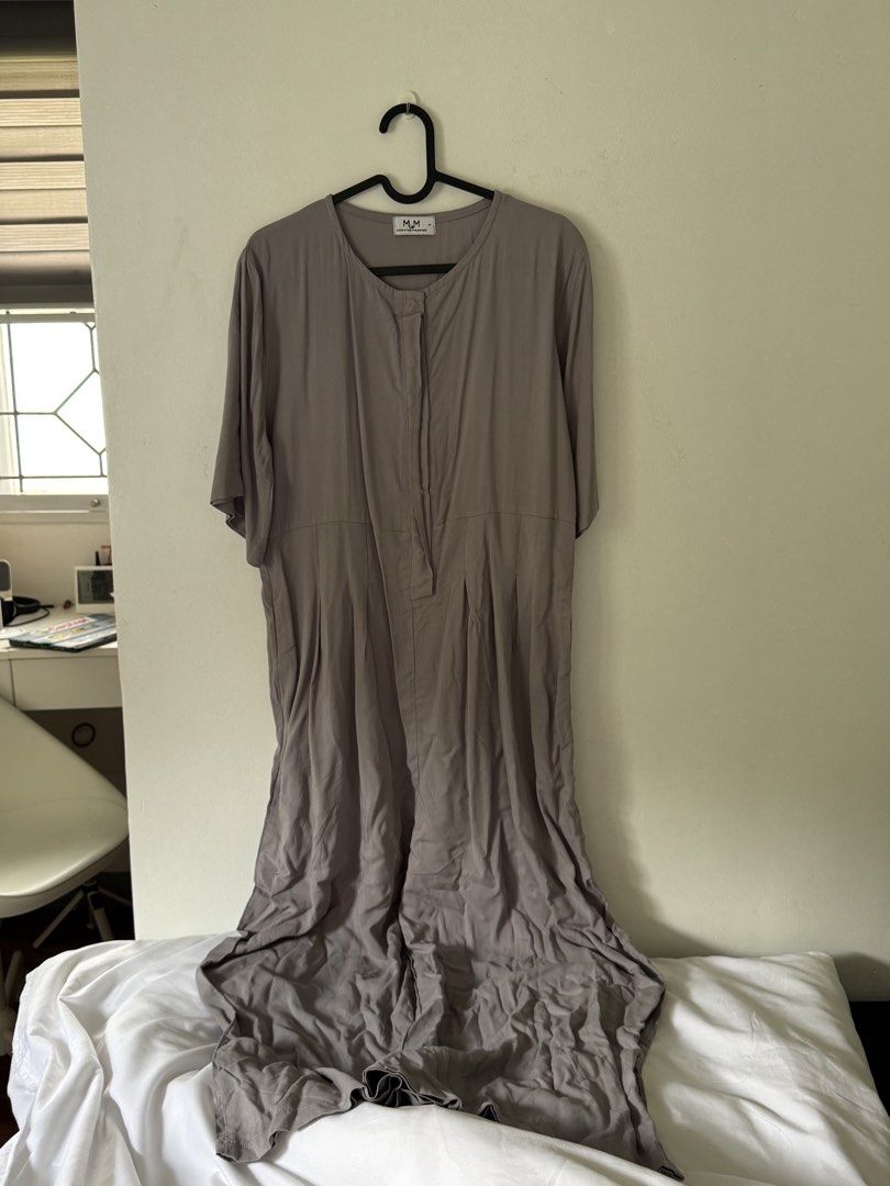 MUM Breastfeeding Full Length Romper (Category: Dresses) located in Pasig City. Submitted by jazgarcia8 (Listing ID 1467696417, Image 1). Description: - Brand: Mum - Color: Grey - Length: Full length - Details: Front breastfeeding access - Fabric: Lightweight and comfortable - Style: Casual, perfect for everyday wear or running errands.