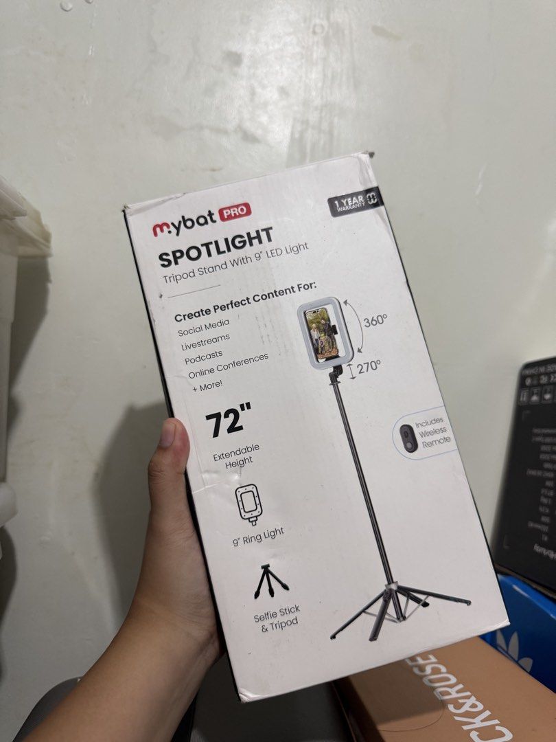 Mybat Spotlight Tripod Stand with LED (Category: Tripods & Monopods) located in El Nido. Submitted by ryshoot (Listing ID 1467792872, Image 2). Description: - Brand new in box with original packaging - 9-inch LED ring light for optimal lighting - Sturdy tripod stand extends up to 72 inches tall - Includes a wireless remote control for convenient capturing - Ideal for social media content, livestreams, podcasts, and online meetings.