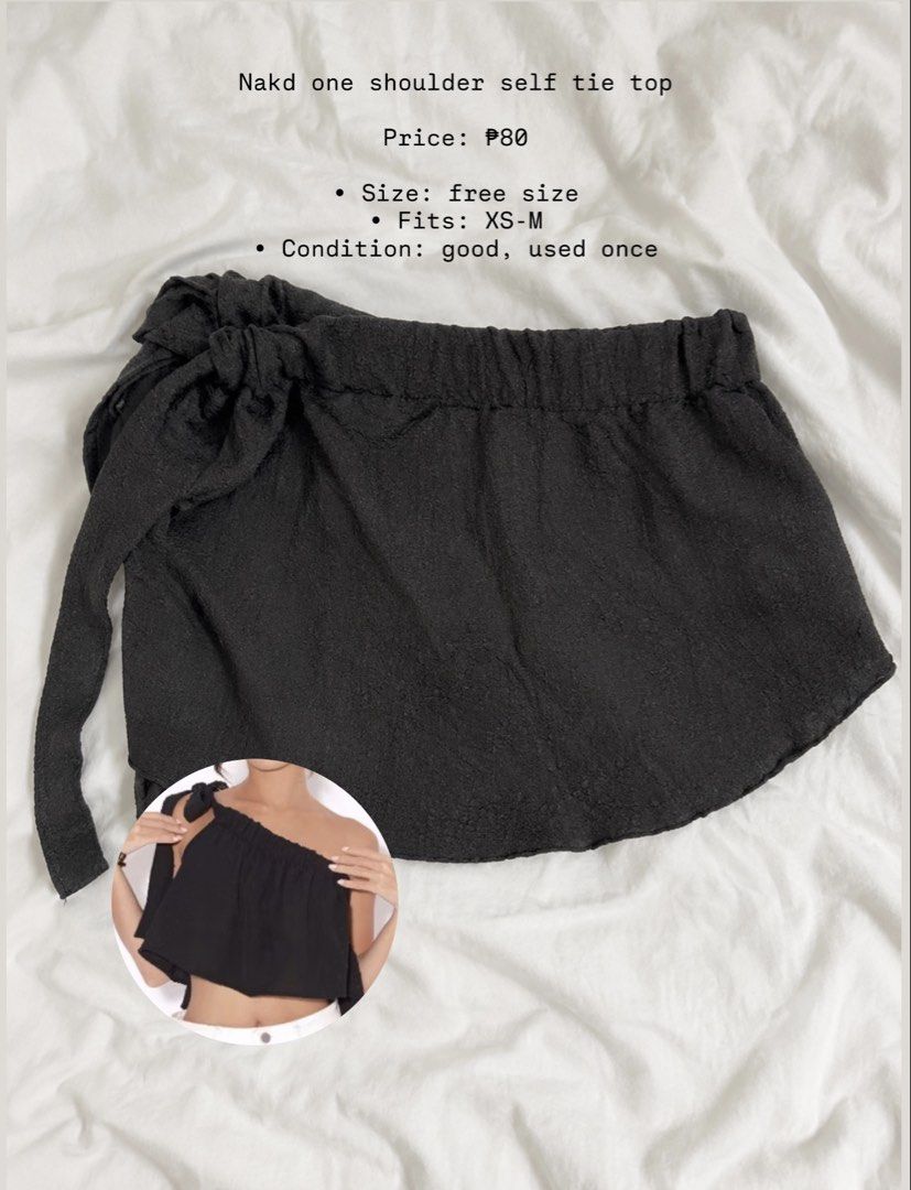Nakd One Shoulder Self Tie Top (Category: Sleeveless) located in Las Pinas. Submitted by prelovedgoodiesph (Listing ID 1467728331, Image 1). Description: - Brand: Nakd - Color: Black - Style: One-shoulder with a self-tie strap - Size: Free size (comfortably fits XS to M frames) - Condition: Worn only once, great shape - Perfect for pairing with high-waist jeans or skirts.