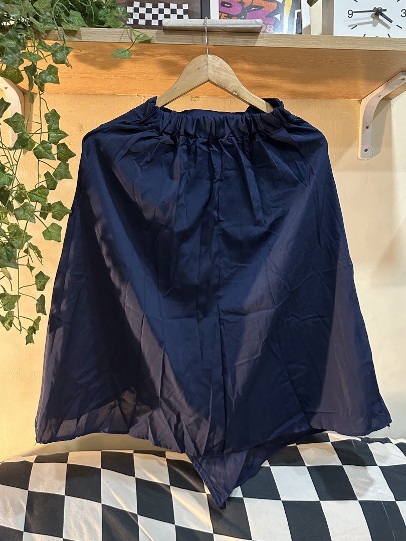 Navy Blue Flowy Culotte Skort (Category: Skirts) located in Manila. Submitted by tenshiii185 (Listing ID 1467680453, Image 1). Description: Dark blue culotte skirt with a comfy elastic waistband. Lightweight and easy to wear for casual days. Needs a quick iron due to storage wrinkles. No brand tag..