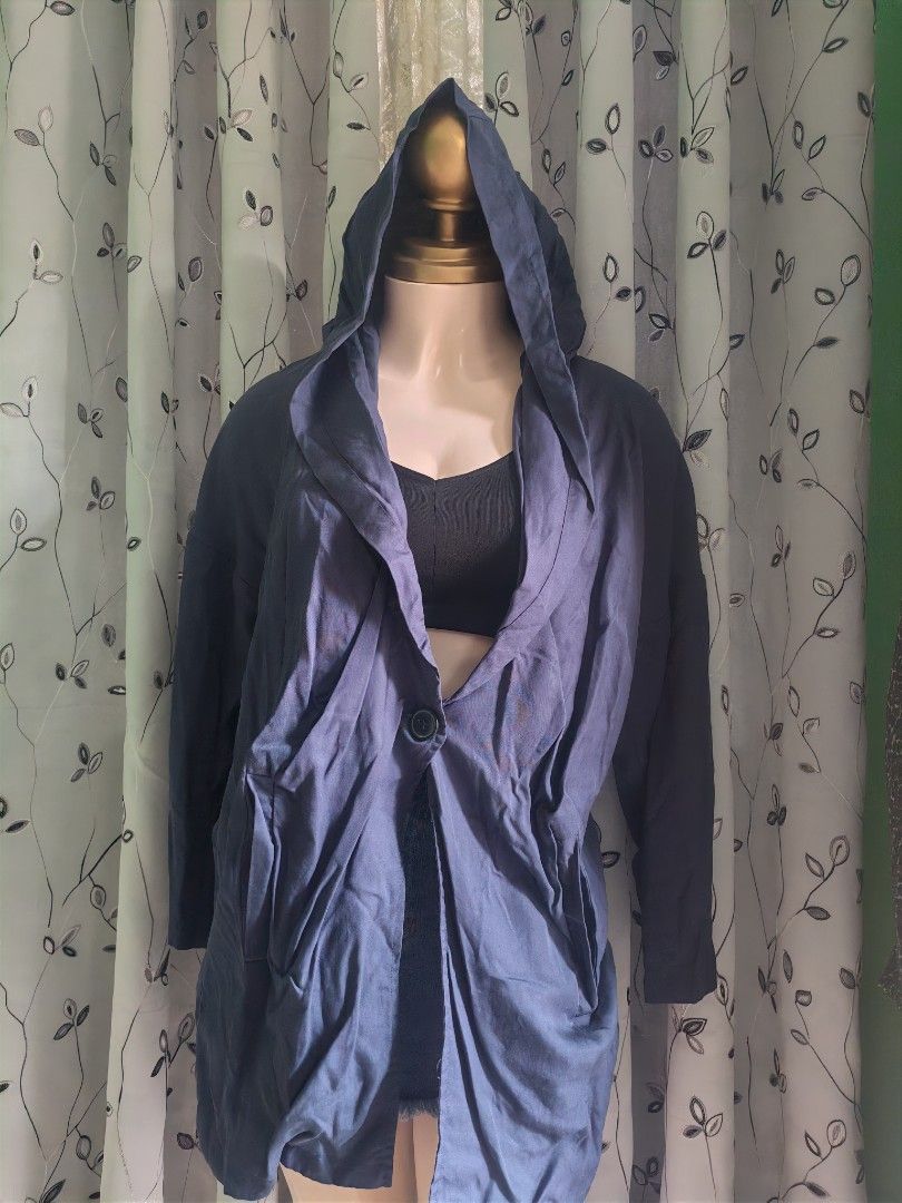 Navy Blue Hooded Cardigan Jacket with Single Button Closure (Category: Coats, Jackets and Outerwear) located in Caloocan City. Submitted by _misskaye (Listing ID 1467604339, Image 2). Description: - Color: Navy blue - Material: Lightweight and comfortable - Fit: Relaxed fit with long sleeves - Features: Hooded design, draped collar, single button closure, and front pockets - Styling: Great layering piece for casual outfits and chilly days.