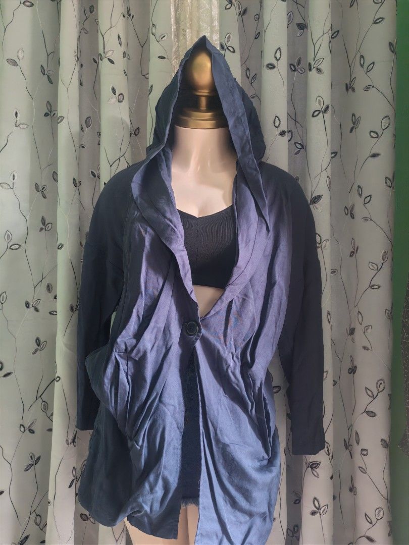 Navy Blue Hooded Cardigan Jacket with Single Button Closure (Category: Coats, Jackets and Outerwear) located in Caloocan City. Submitted by _misskaye (Listing ID 1467604339, Image 3). Description: - Color: Navy blue - Material: Lightweight and comfortable - Fit: Relaxed fit with long sleeves - Features: Hooded design, draped collar, single button closure, and front pockets - Styling: Great layering piece for casual outfits and chilly days.