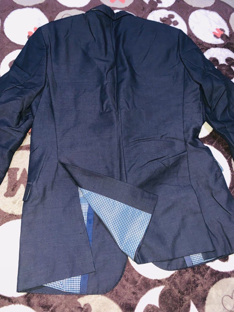 Navy Blue Zara Man Coat (Category: Coats, Jackets and Outerwear) located in Pasig City. Submitted by nyca1989 (Listing ID 1467767703, Image 3). Description: Navy blue men’s suit jacket or blazer with a two-button closure and a blue-and-white checked inner lining, featuring the “Zara Man” brand label near the collar. Medium Used once.