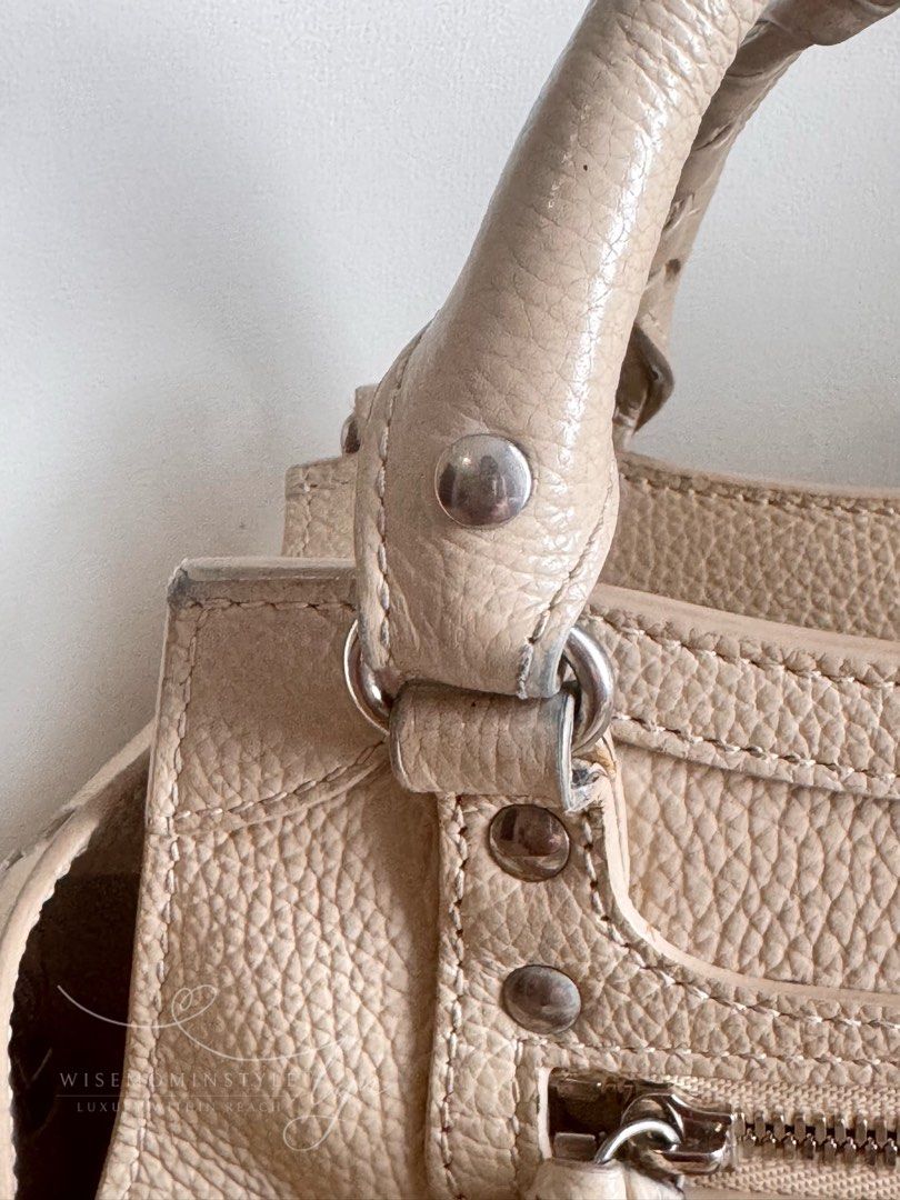 Neo Classic City Tote Bag (Category: Luxury Bags & Wallets) located in Bacoor. Submitted by iammommylyn (Listing ID 1467745838, Image 3). Description: ON HAND & READY TO SHIP. Pre-loved Neo Classic City Bag Mini in Grained Calfskin Leather. Beige color. ✔️Rank: A, signs of usage ✔️Material: grained calfskin leather ✔️Inclusion: dustbag, authenticity card, detachable shoulder strap ✔️Origin: Italy ✔️Dimensions: 21cm (h) x 33cm (w) x 14cm (d); hand