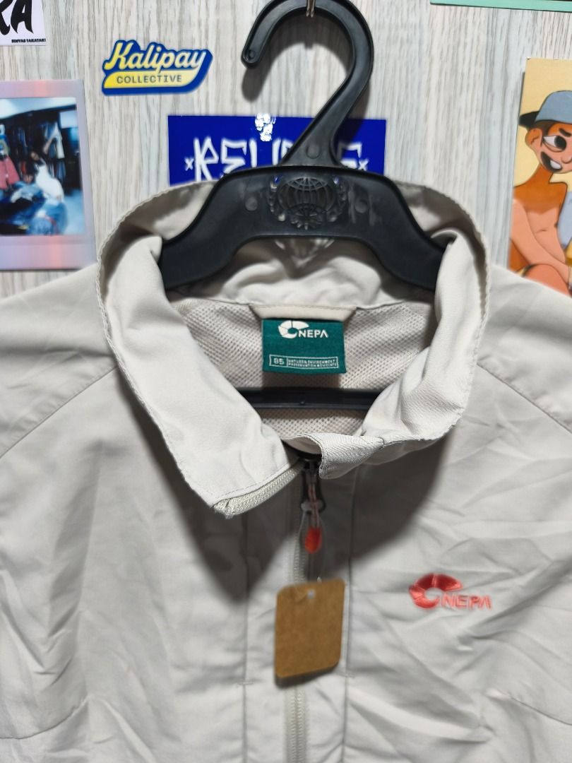NEPA Beige Hooded Long Windbreaker Jacket (Category: Coats, Jackets and Outerwear) located in Davao. Submitted by thethriftproject082 (Listing ID 1467794285, Image 3). Description: Nepa Outdoor 📍𝐌𝐈𝐍𝐄: 380 📍𝐒𝐈𝐙𝐄 𝐎𝐍 𝐓𝐀𝐆: Fits Small-Med 📍𝐃𝐈𝐌𝐄𝐒: 18 x 29.