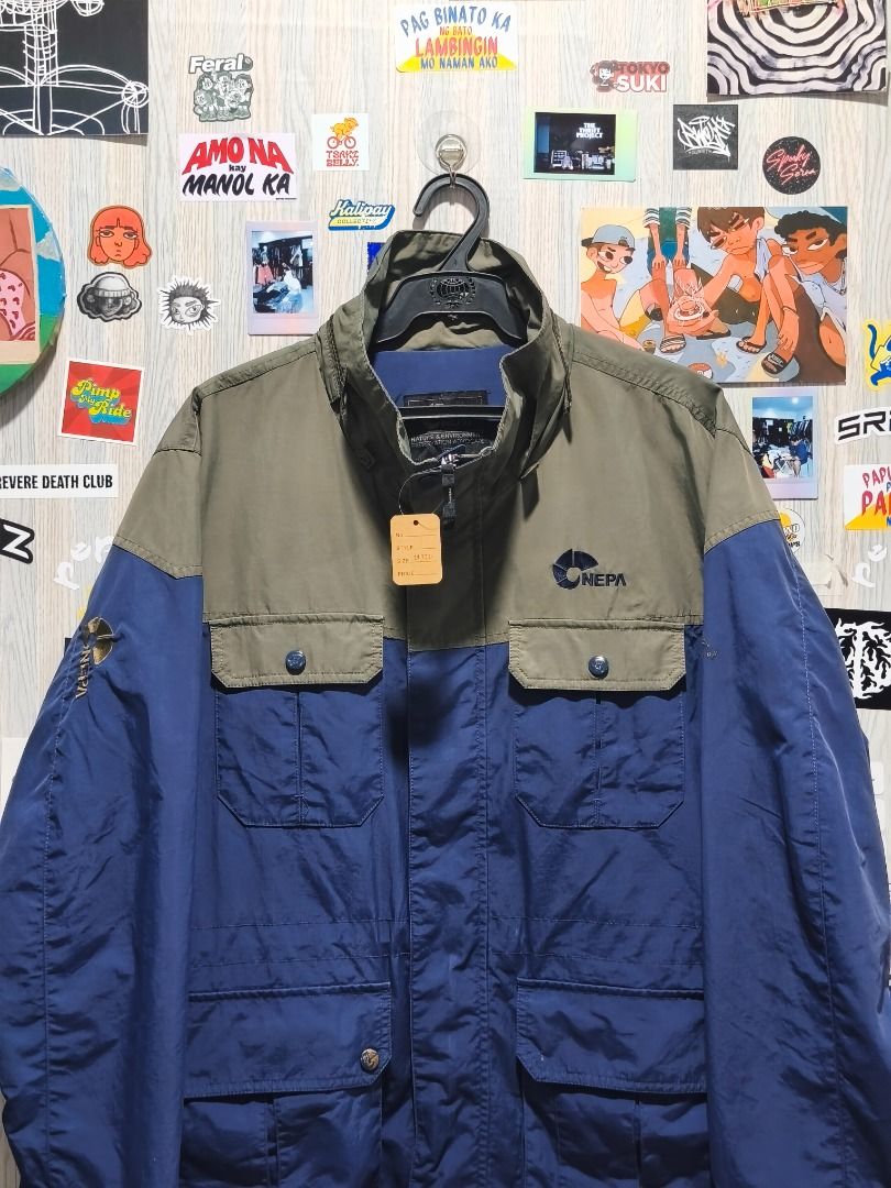 Nepa Evolution Parka Jacket (Category: Coats, Jackets and Outerwear) located in Davao. Submitted by thethriftproject082 (Listing ID 1467794392, Image 2). Description: Nepa Evolution Parka Jacket 📍𝐌𝐈𝐍𝐄: 450 📍𝐒𝐈𝐙𝐄 𝐎𝐍 𝐓𝐀𝐆: 📍𝐃𝐈𝐌𝐄𝐒: 22 x 29 - Brand: NEPA - Colorway: Two-tone olive green and blue - Weather Protection: Heavy-duty build designed for the outdoors - Storage: Multiple front utility pockets with secure button flaps - Des