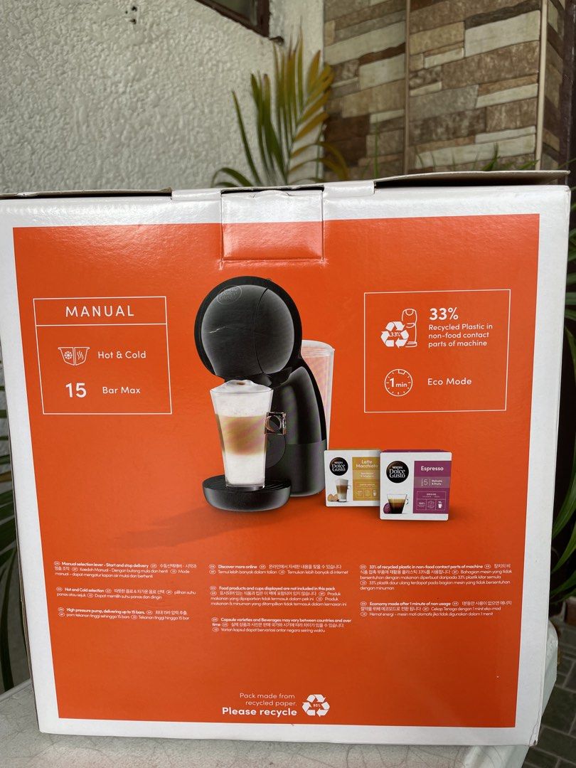 NESCAFÉ Dolce Gusto Piccolo XS Coffee Machine (Category: Coffee Machines & Makers) located in Manila. Submitted by ramzee (Listing ID 1467627083, Image 2). Description: - Color: Sleek black compact design - Drinks: Makes espresso, latte, cappuccino, and americanos (hot & cold) - Performance: 15-bar high-pressure pump system - Energy Saving: Eco mode auto-shuts off after 1 minute of inactivity - Packaging: Includes original box with complete drink