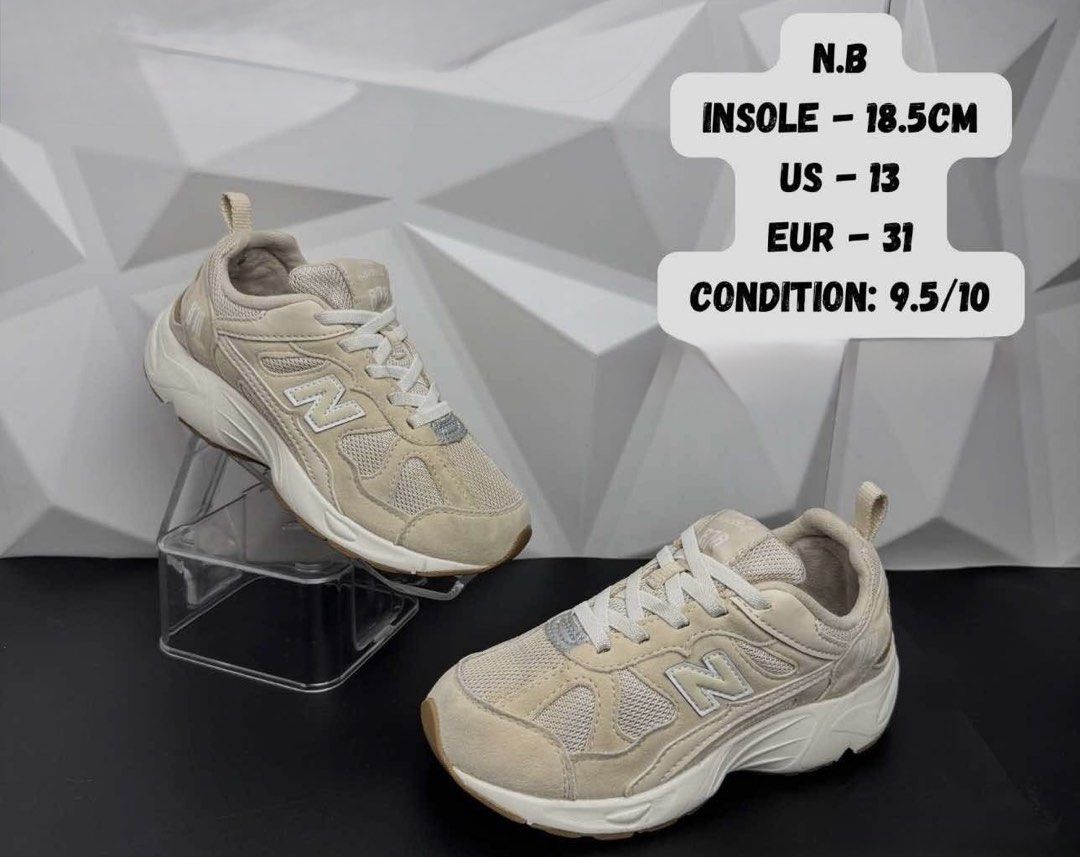 New Balance Kids Shoes Size (Category: Babies & Kids Fashion) located in Manila. Submitted by sherilynpreloved (Listing ID 1467717464, Image 1). Description: - Brand: New Balance - Color: Neutral beige with matching laces - Size: US 13 / EUR 31 (18.5 cm insole) - Materials: Breathable mesh panels and durable suede overlays - Soles: Chunky white midsoles for comfort and style - Condition: Used.