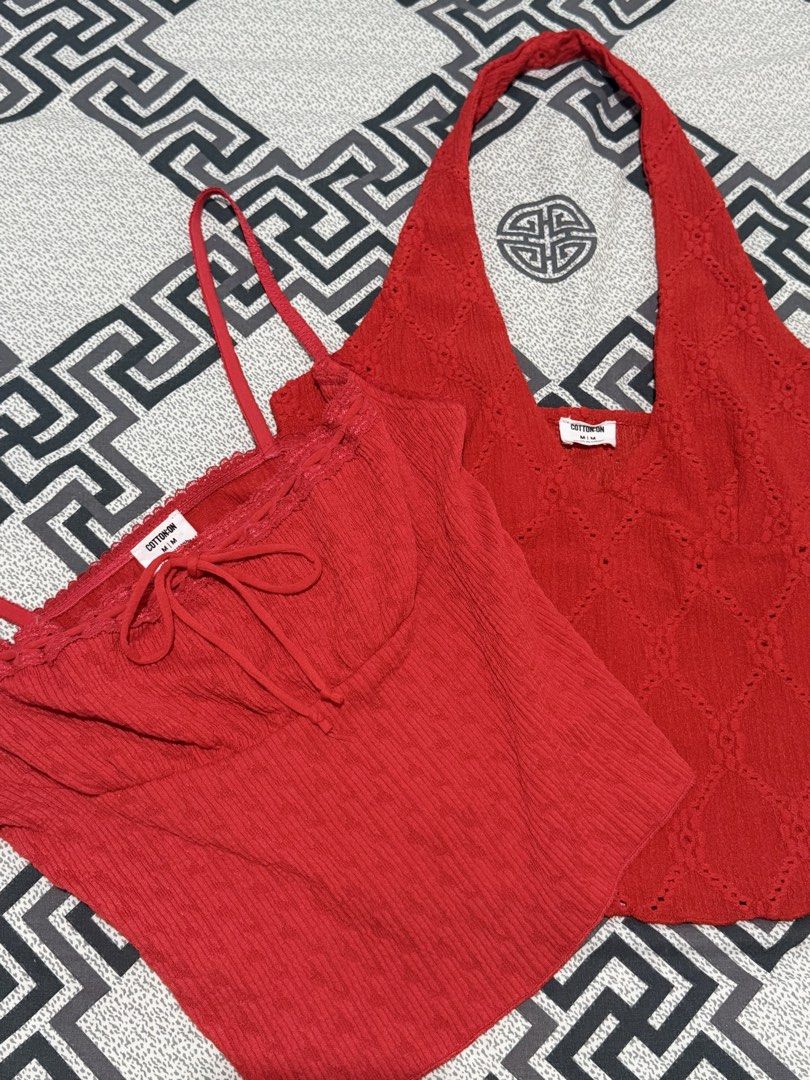NEW Cotton On Red Tops Bundle Size M (Category: Sleeveless) located in Valenzuela. Submitted by ellapsl (Listing ID 1467726297, Image 2). Description: - Brand: Cotton On - Size: Medium (M) - Quantity: Set of 2 red tops - Piece 1: Spaghetti strap cami with tie-front string and delicate lace trim - Piece 2: Halter neck top featuring an all-over eyelet diamond pattern - Condition: Brand new with clear brand tags attached inside - Style: Versatile wa