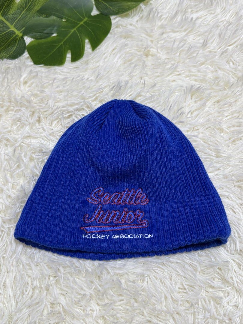 New Era Beanie Hat kids (Category: Caps & Hats) located in Dagupan City. Submitted by iamrannflores (Listing ID 1467626556, Image 1). Description: - Authentic New Era beanie in a vibrant bright blue color - Features Seattle Junior Hockey Association embroidery on the front - Small tonal New Era flag logo on the side - Cozy ribbed knit exterior with a soft fleece lining inside for maximum warmth - Great winter headwear option for hockey fans and c