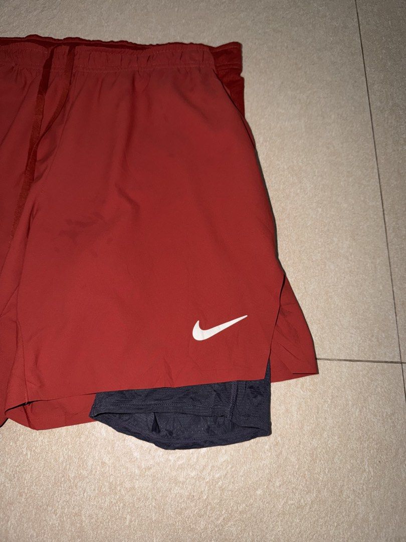 NIKE 2in1 RUNNING SHORT with inner tight compression (Category: Shorts) located in Manila. Submitted by triptothrift7 (Listing ID 1467755167, Image 3). Description: message if you are interested! for fast transaction N*KE 2in1 RUNNING SHORT with inner tight compression for only 899 size medium waistline 30 x 34 length 16 above the knee no issue need wash only excellent condition color rate 9/10 authentic legit mode of payment gcash or bank transf