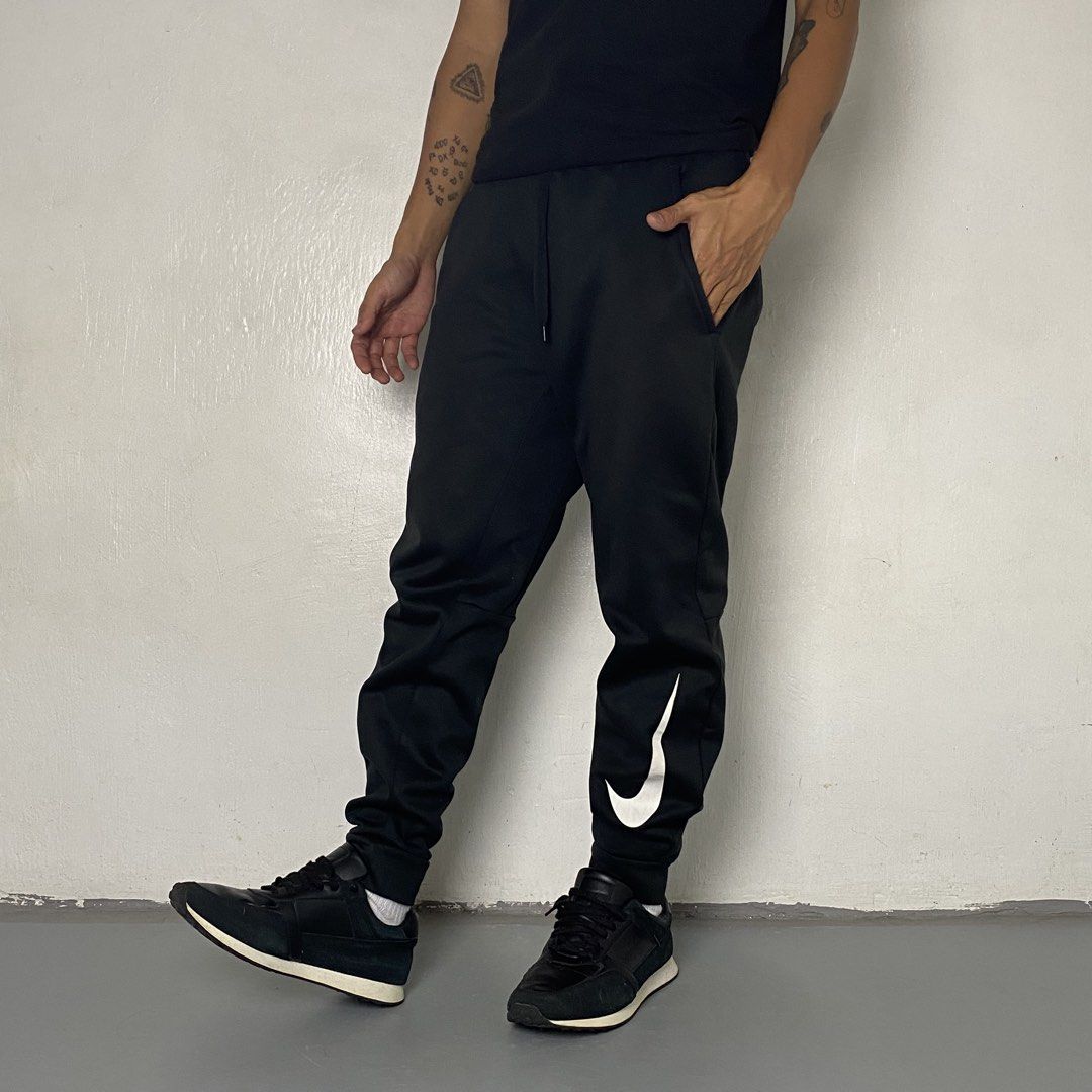 NIKE 👟| Black Therma Swoosh Training Pants (Category: Joggers) located in Bulacan. Submitted by orc.ph (Listing ID 1467716183, Image 3). Description: NIKE 👟| Black Therma Swoosh Training Pants Material Used: 100% Polyester -Black -Japan -Dri-FIt -Elastic Waistband -Internal Adjustable Drawstring -Nike Side Swoosh Logo -Casual -Streetwear -Side Slip Pockets -Size: XS-XL -Waistline: “24-36 -Length: “36 -Thighs: “9 -Leg Opening: “6 -Rise: “13 -Mod