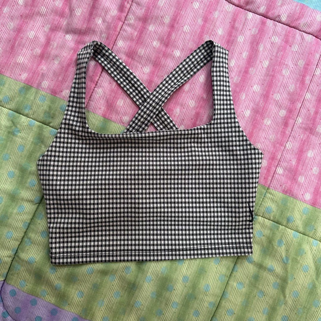 Nike - Yoga Cropped Gingham Tank Top (Category: Activewear) located in Muntinlupa City. Submitted by pickjes (Listing ID 1467753574, Image 1). Description: 100% Authentic Nike Size: Medium in tag but runs small. Measurements posted. Details: not padded but has lining Condition: Like new, used only once. No flaws. Rfs: no longer fits me Dri-FIT - Technology helps to keep you feeling dry and comfortable. Minimal Sewing Lines - Create a smooth silho