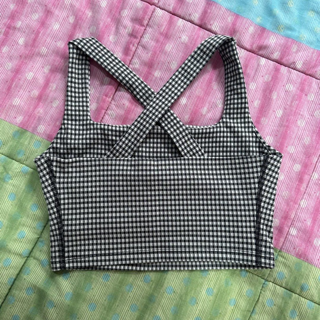 Nike - Yoga Cropped Gingham Tank Top (Category: Activewear) located in Muntinlupa City. Submitted by pickjes (Listing ID 1467753574, Image 3). Description: 100% Authentic Nike Size: Medium in tag but runs small. Measurements posted. Details: not padded but has lining Condition: Like new, used only once. No flaws. Rfs: no longer fits me Dri-FIT - Technology helps to keep you feeling dry and comfortable. Minimal Sewing Lines - Create a smooth silho